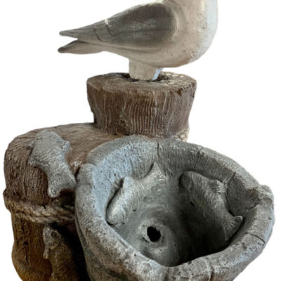 Seagull on fountain top